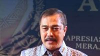 Agus Andrianto Raih